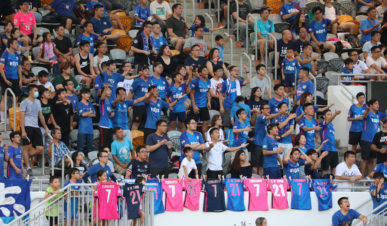 Fans chant slogans during a Premier League match between Kitchee and Yuen Long on September 14. Photo: Felix Wong