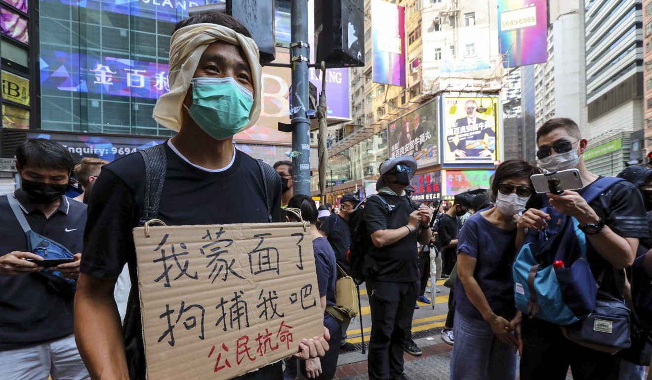 Anti-mask law protesters in Causeway Bay. Photo: Felix Wong