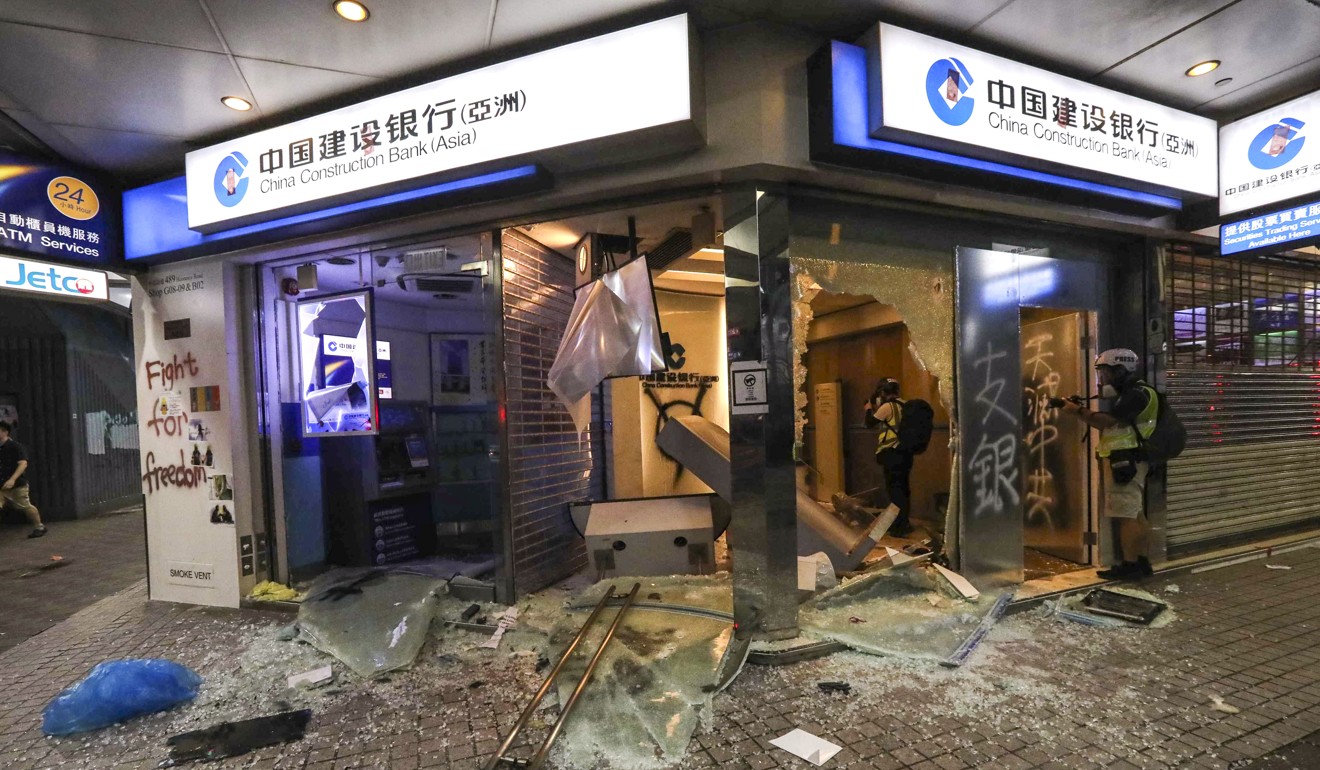 A China Construction Bank branch is among premises trashed. Photo: Felix Wong