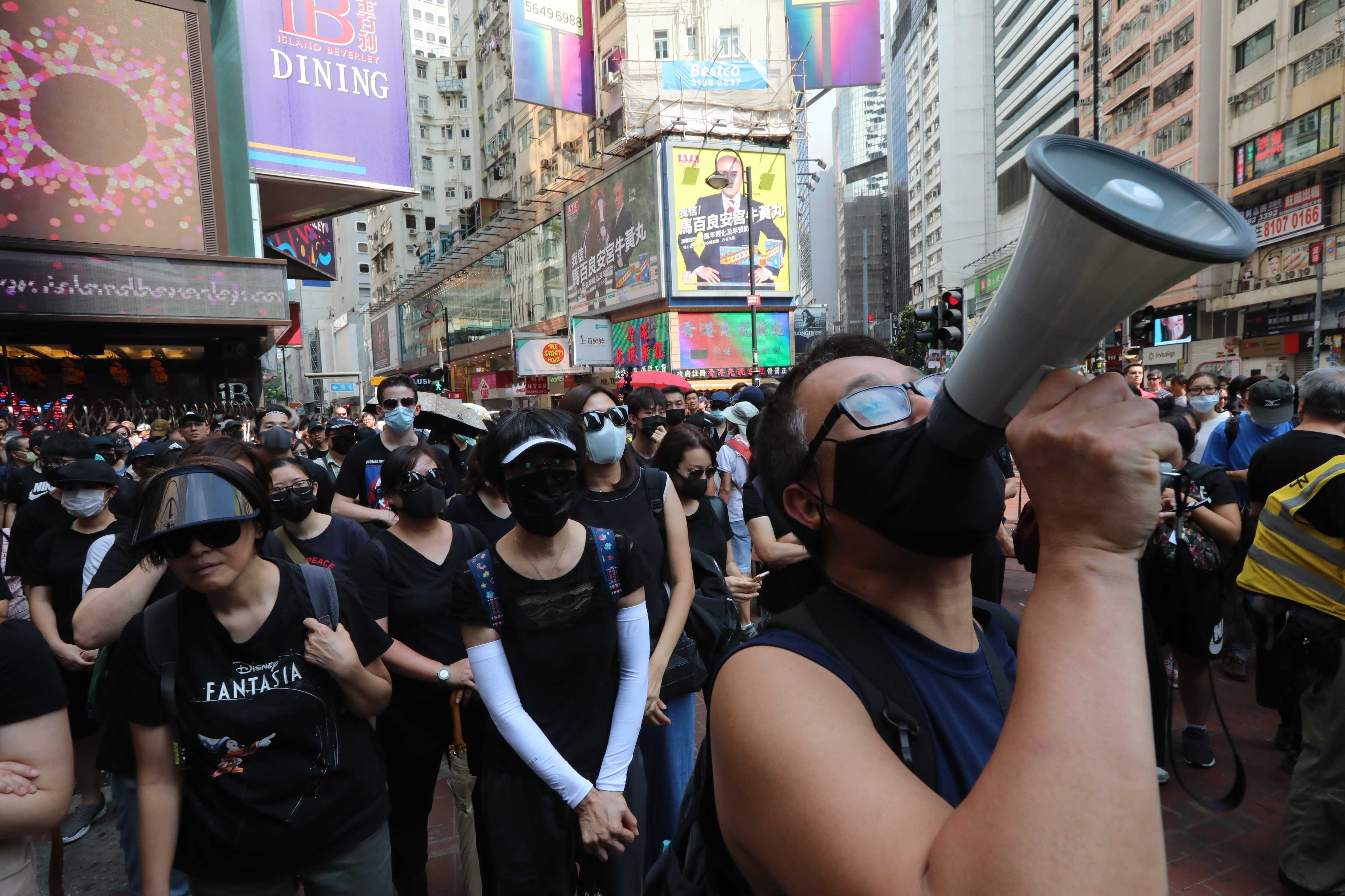 Anti-government protesters march from Causeway Bay to Central on October 5, 2019, defying the newly issued anti-mask law. Photo: Felix Wong