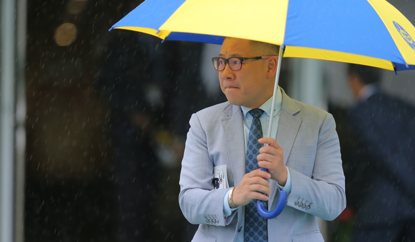 Dennis Yip braves the wet weather at Sha Tin. Photo: Kenneth Chan