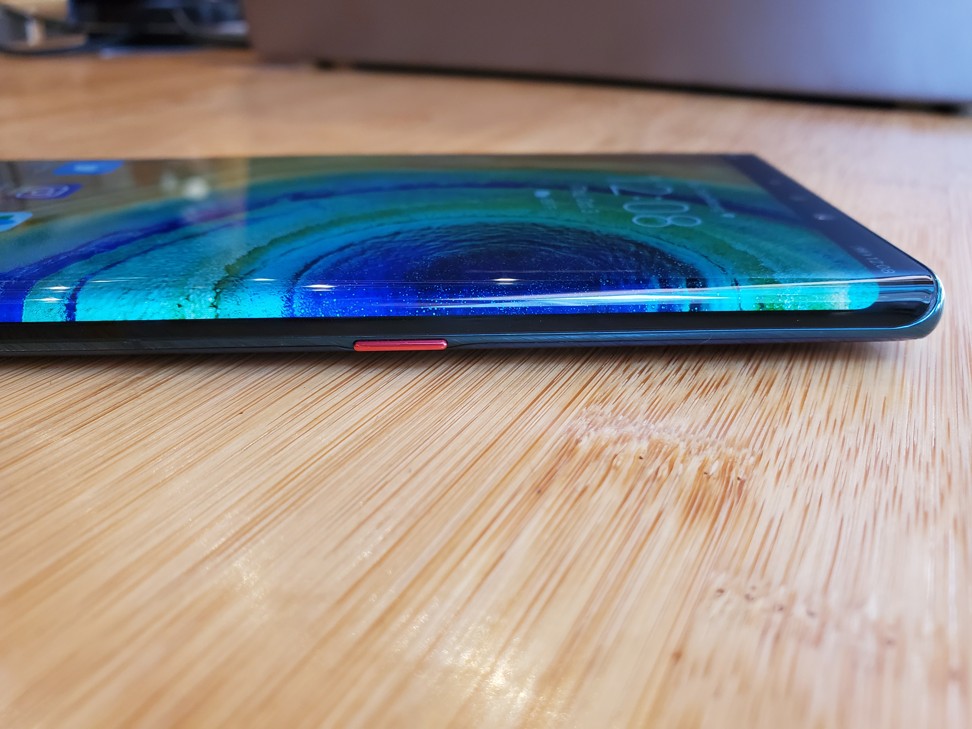 The curvature at the edges of the Huawei Mate 30 Pro’s screen is radical, so much so that the power button sits further back than usual. Photo: Ben Sin