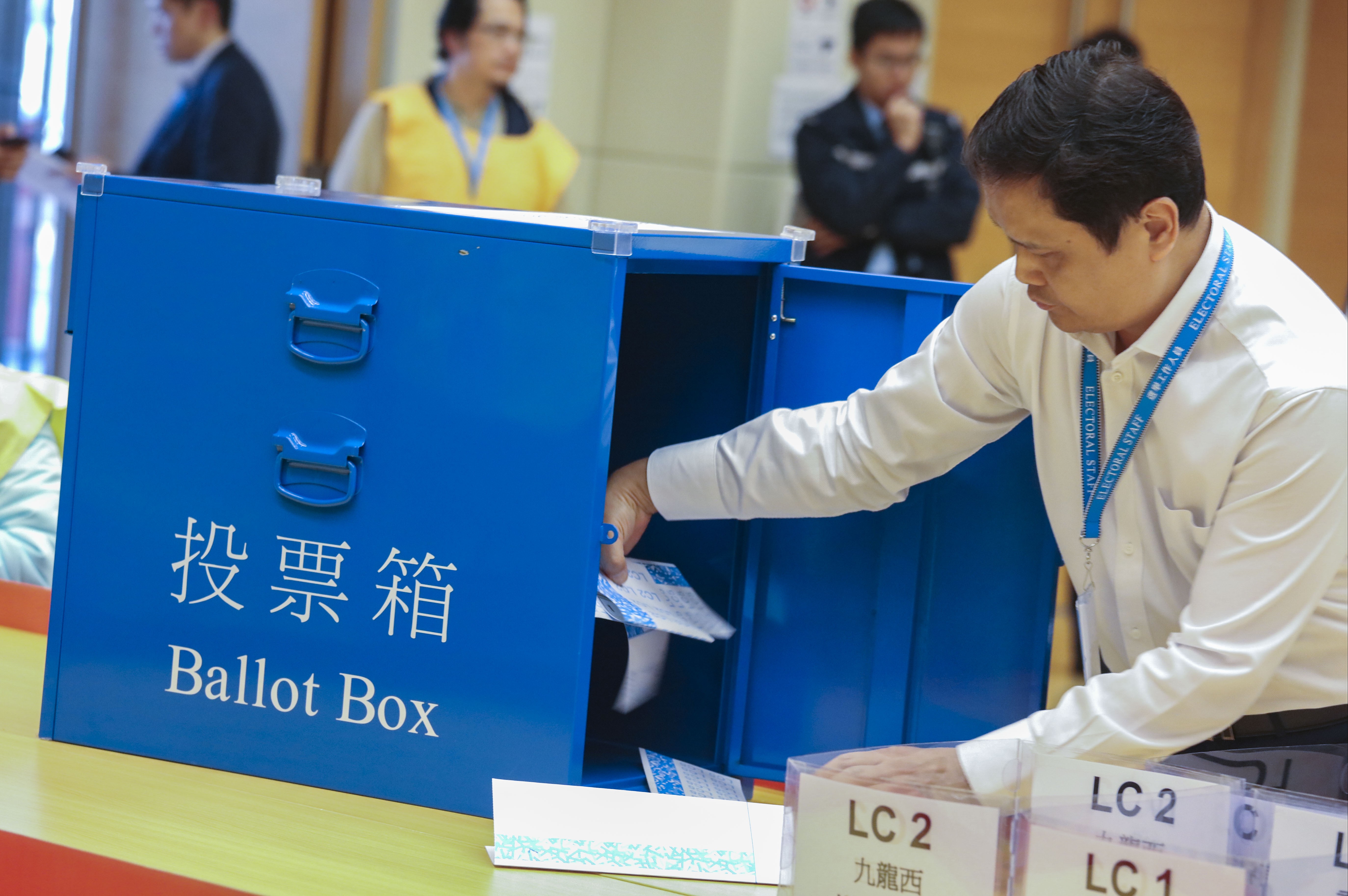 Ballot boxes are sorted into different constituencies during the 2018 Legislative Council by-election. Photo: Felix Wong