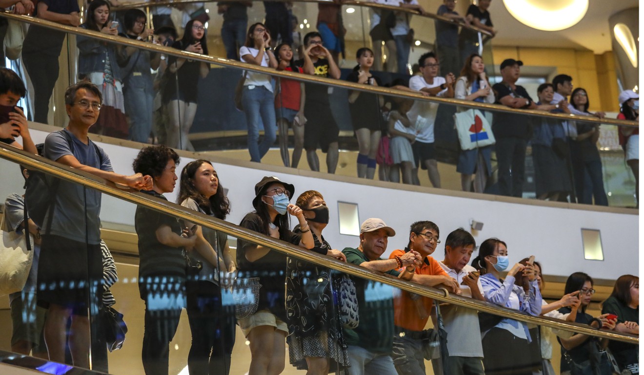 Protesters gather and sing at Tai Koo Shing. Photo: Nora Tam