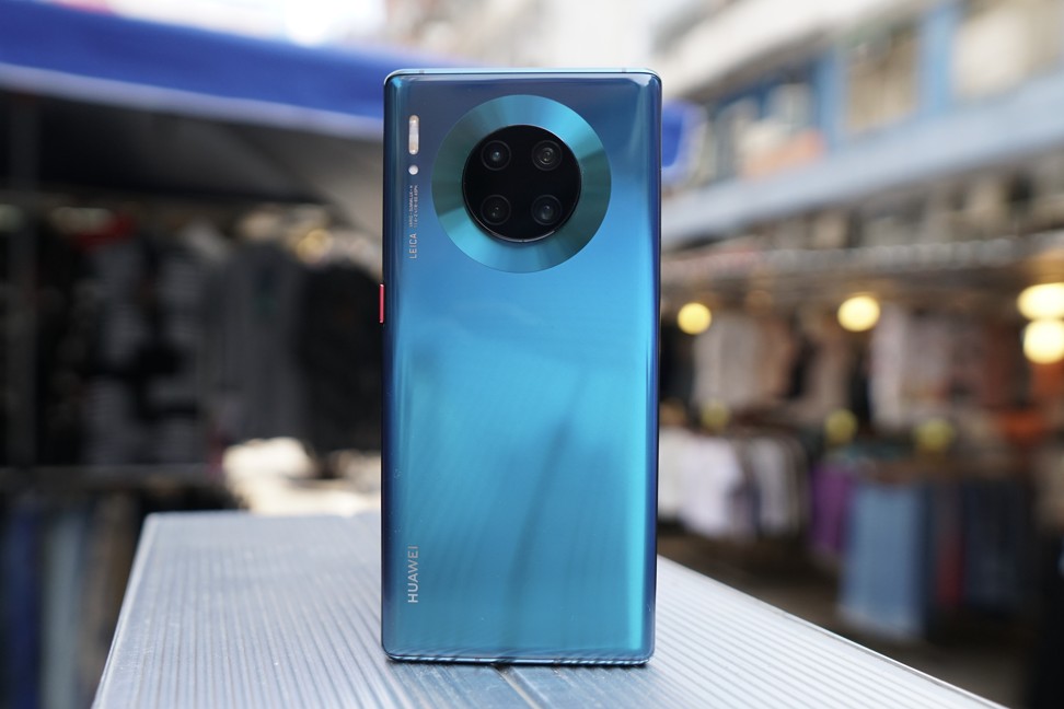 The Huawei Mate 30 Pro has a unique back design with a large circular camera module hosting four cameras and a textured ring that wraps around the module, giving it extra visual flair. Photo: Ben Sin