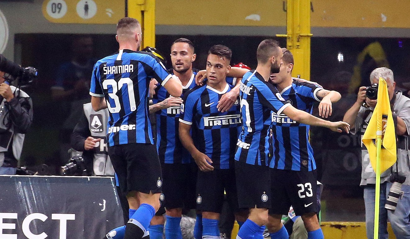 Inter's Lautaro Martinez (C) celebrates after scoring against Juventus. Photo: EPA