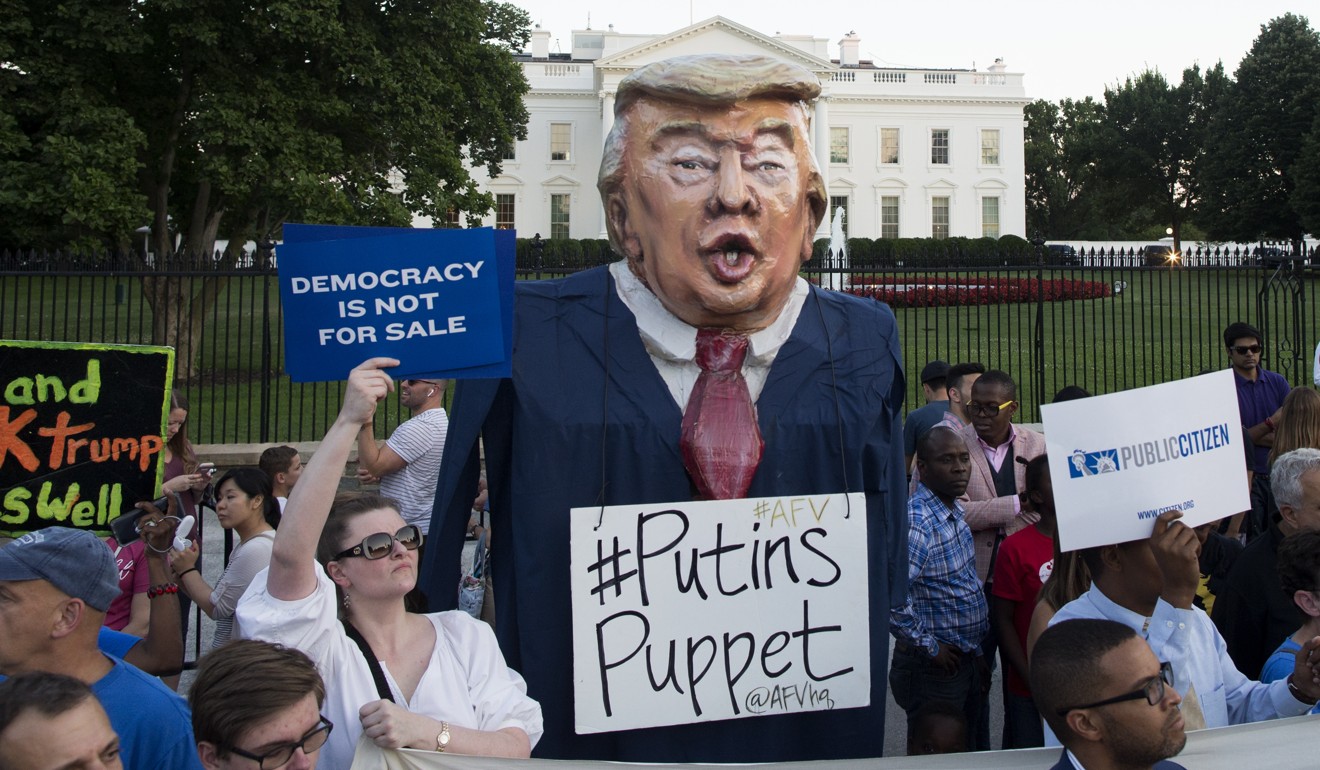 Labelled “Putin’s Puppet”, an oversized figure depicting US President Donald Trump is seen at a protest outside the White House in July 2018. Photo: EPA-EFE