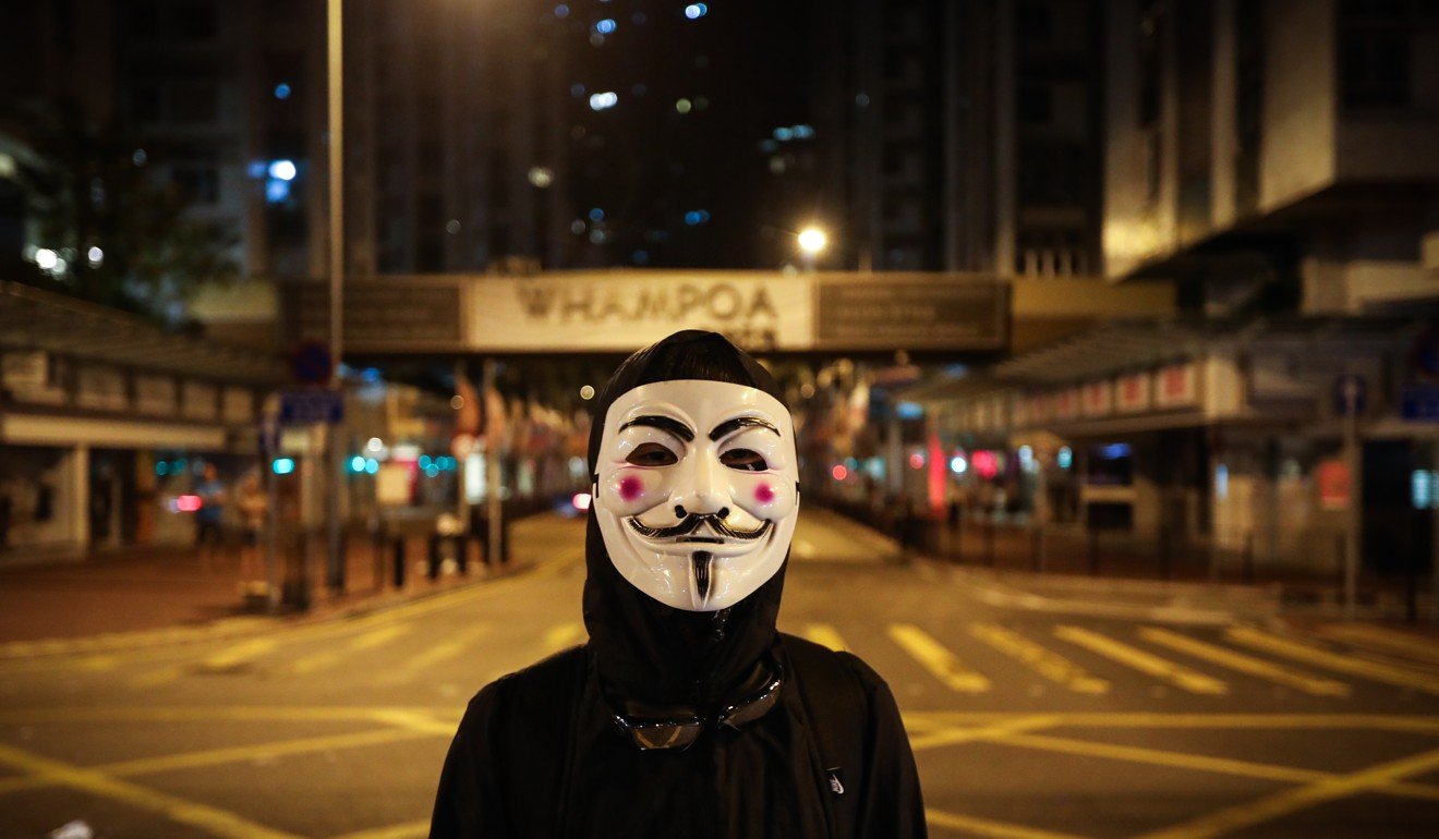 At least 77 arrested over antimask law, as Hong Kong police say