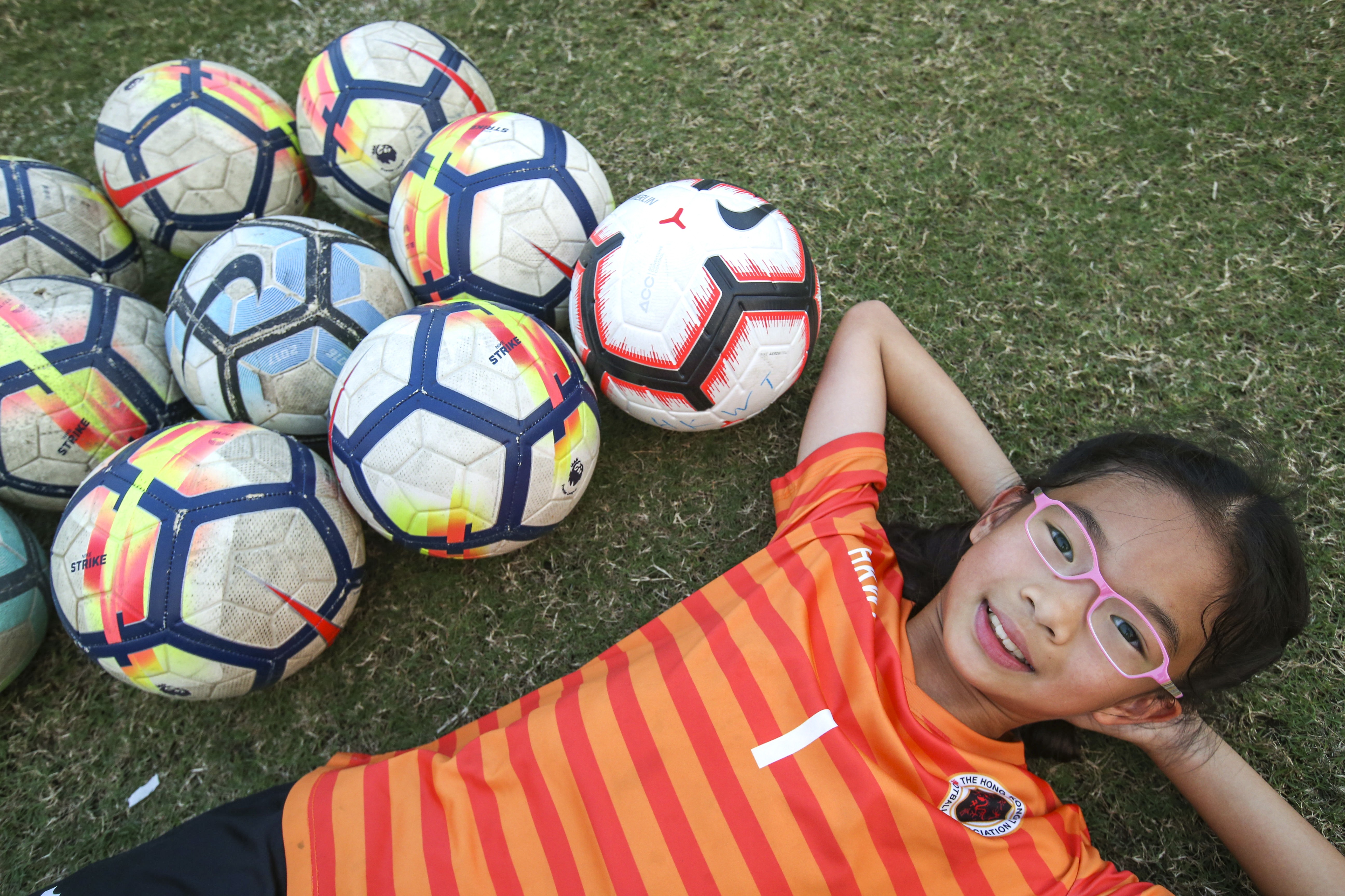 Aspiring football player Annabel Yue has written a book encouraging other young girls to take up the sport. Photo: David Wong