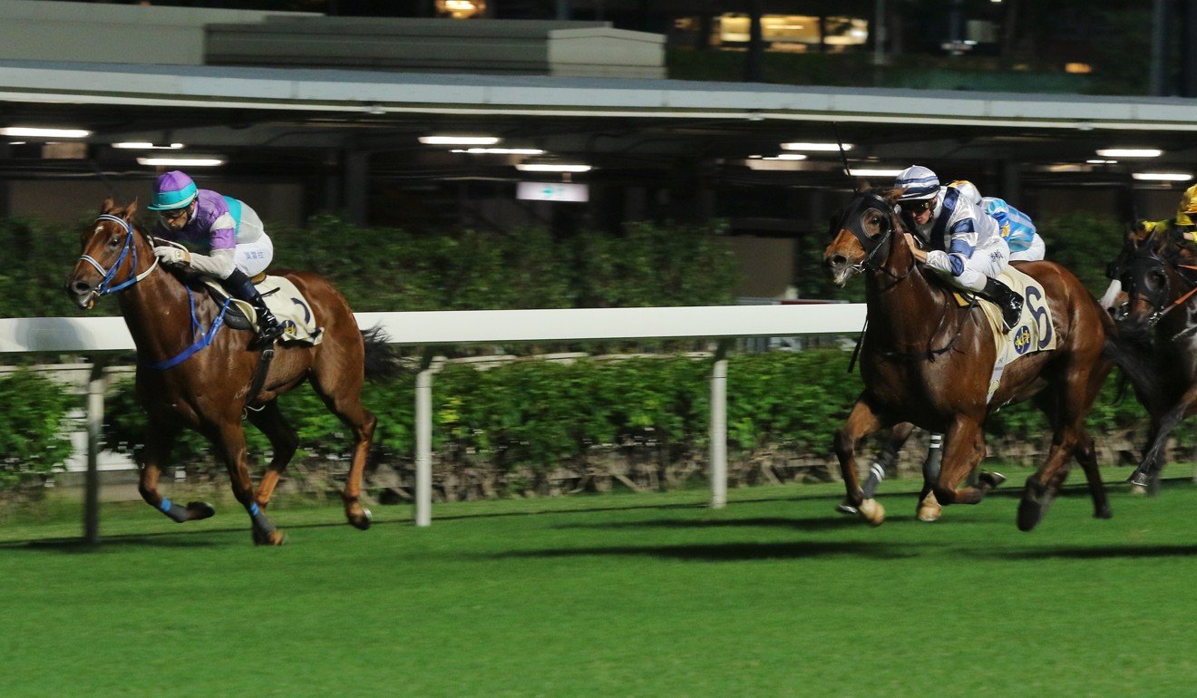 Zac Purton boots Starlot to victory at Happy Valley on Wednesday night. Photo: Kenneth Chan