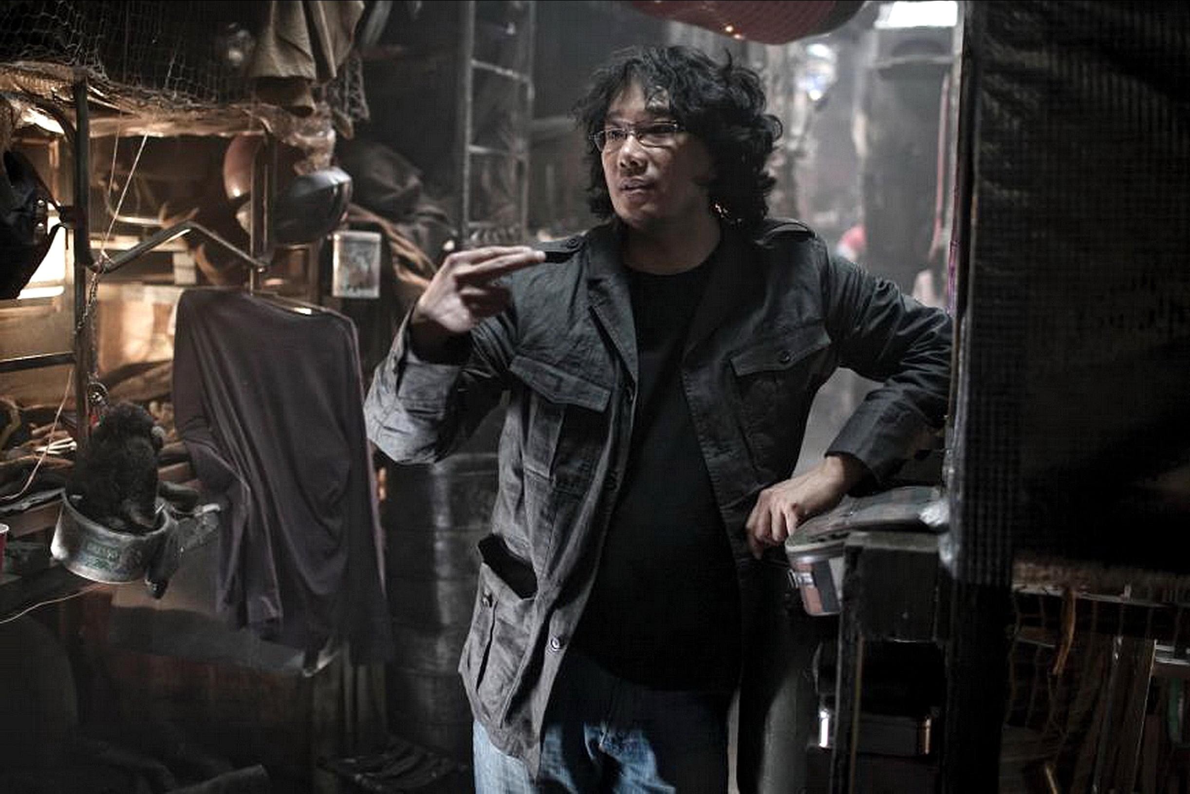 Korean director Bong Joon-ho on the set of Snowpiercer. Photo: Alamy