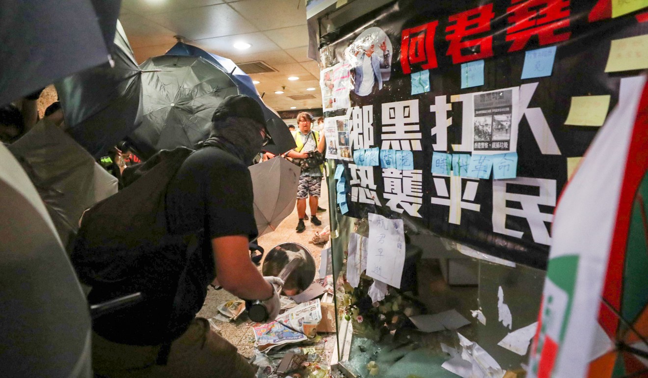 Protesters smashing Junius Ho’s Tsuen Wan office. The pro-Beijing lawmaker has become a hate figure for the movement. Photo: Sam Tsang