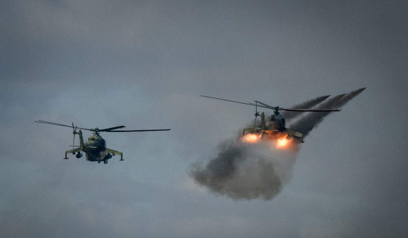 Russian military helicopters are seen in a September 2018 military drill. Photo: AFP