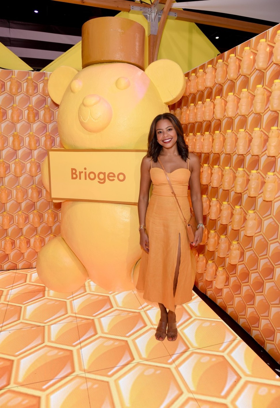 Briogeo founder Nancy Twine stands next to Briogeo’s display for its new honey hair mask. Photo: Getty Images