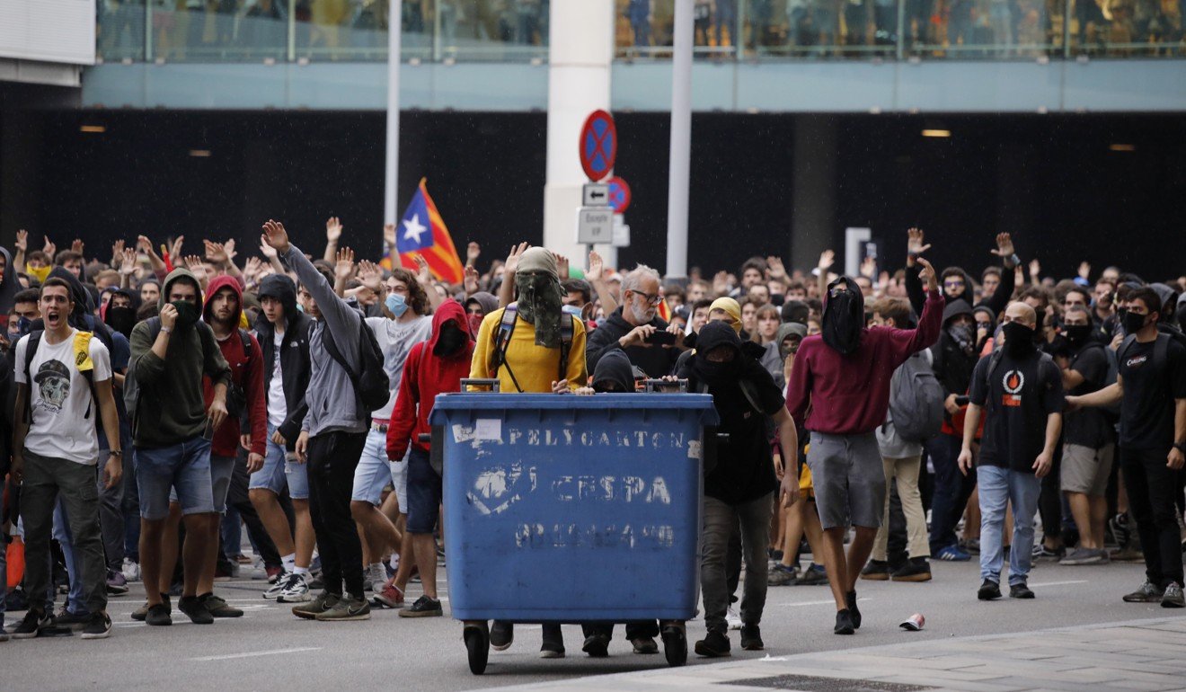 Violent Clashes Erupt At Barcelona Airport After Spain Jails Catalan ...