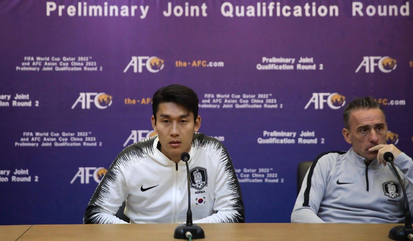 South Korean national football team player Lee Yong (left) and head coach Paulo Bento taking part in a press conference at the Kim Il-Sung Stadium in Pyongyang. Photo: AFP
