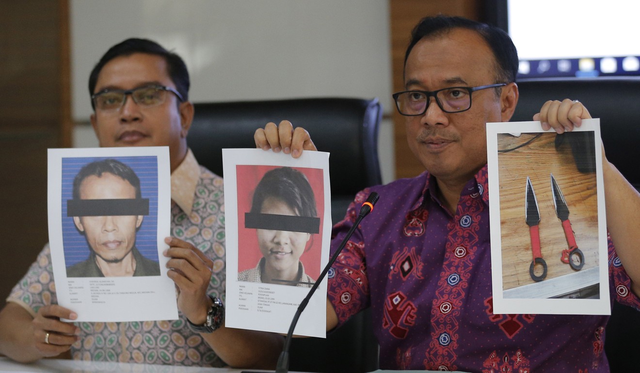 Indonesian police show photos of the suspects who stabbed chief security minister Wiranto with sharp objects. Photo: AP