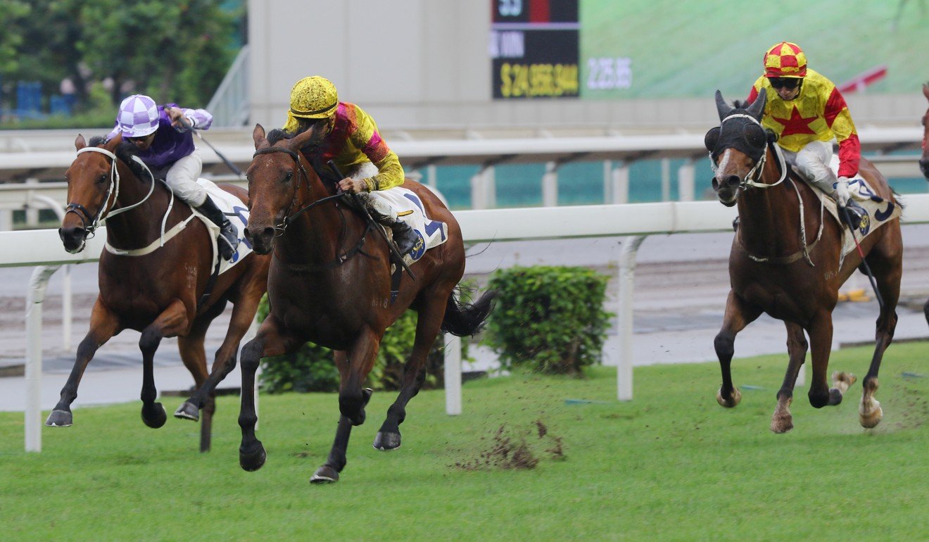 Ho Ho Khan races through the mud at Sha Tin.