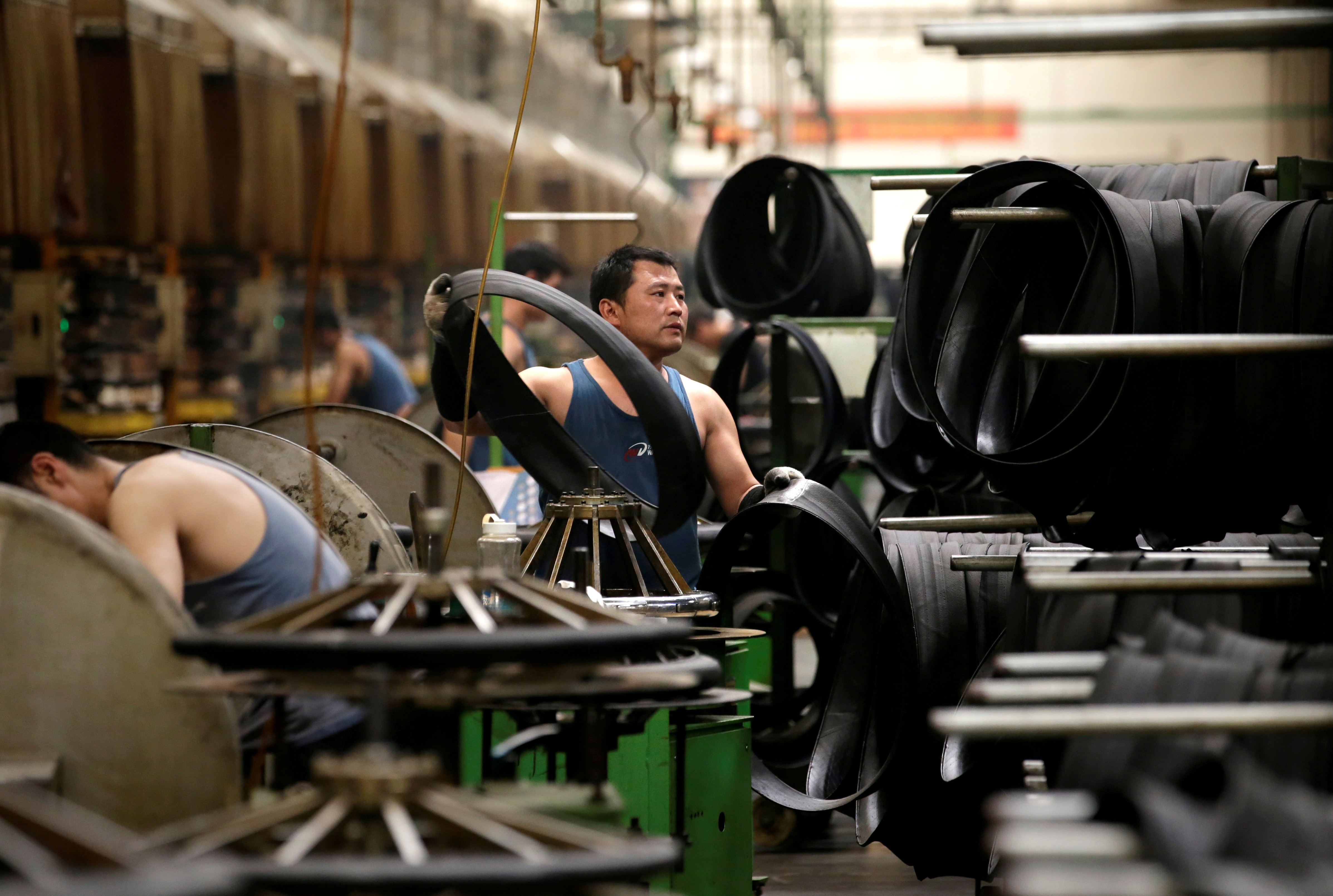 China’s gruelling trade war with the US has hit exports and factory output. Photo: Reuters