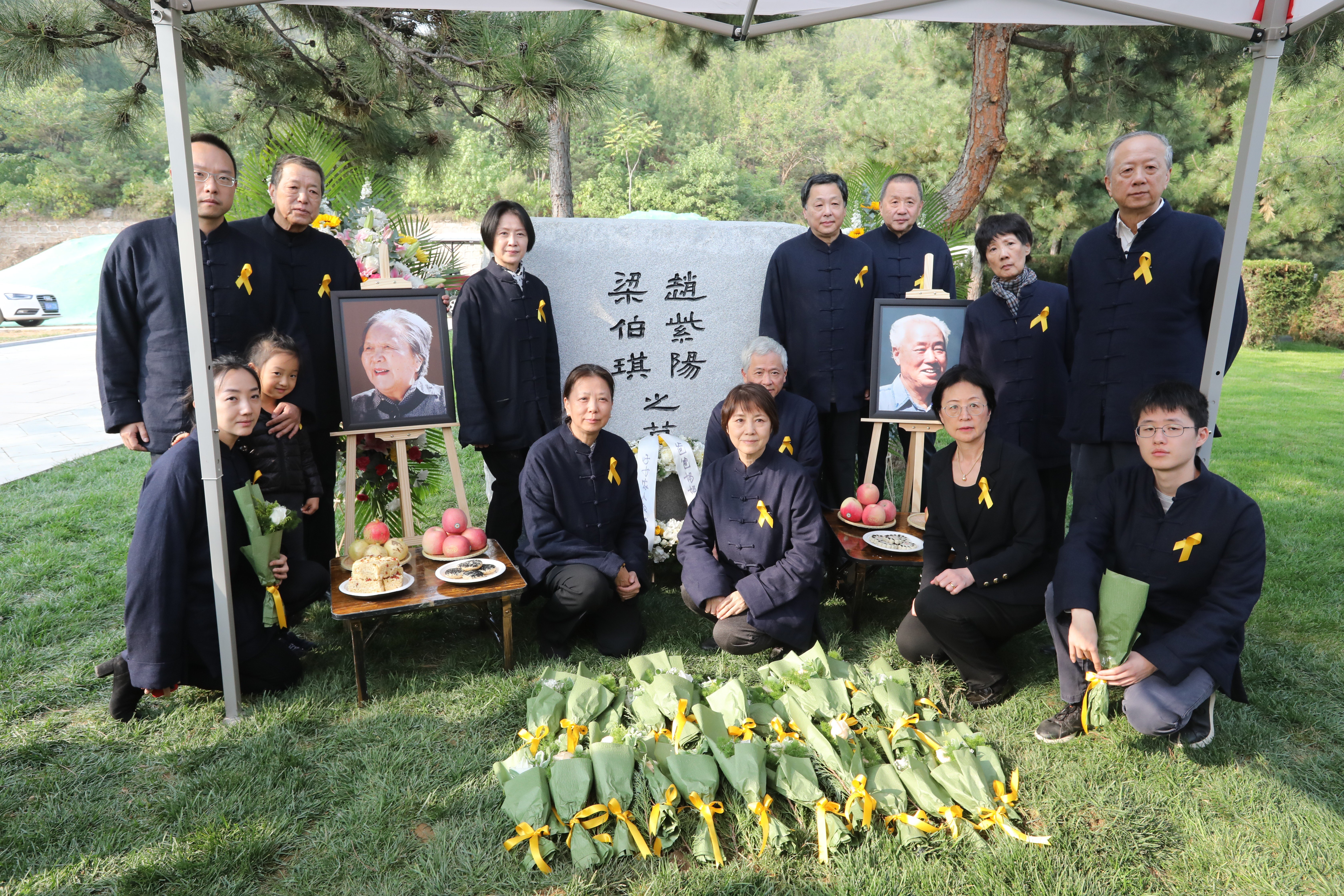The family of Zhao Ziyang and his wife Liang Boqi pay their respects at the grave where their ashes were interred on Friday. Photo: Simon Song