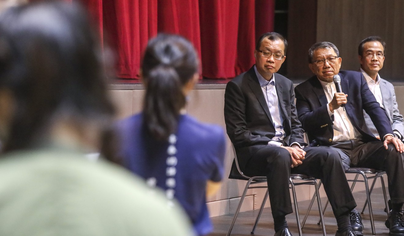 Professor Rocky Tuan (second from right, seated) meets students and alumni. Photo: K.Y. Cheng