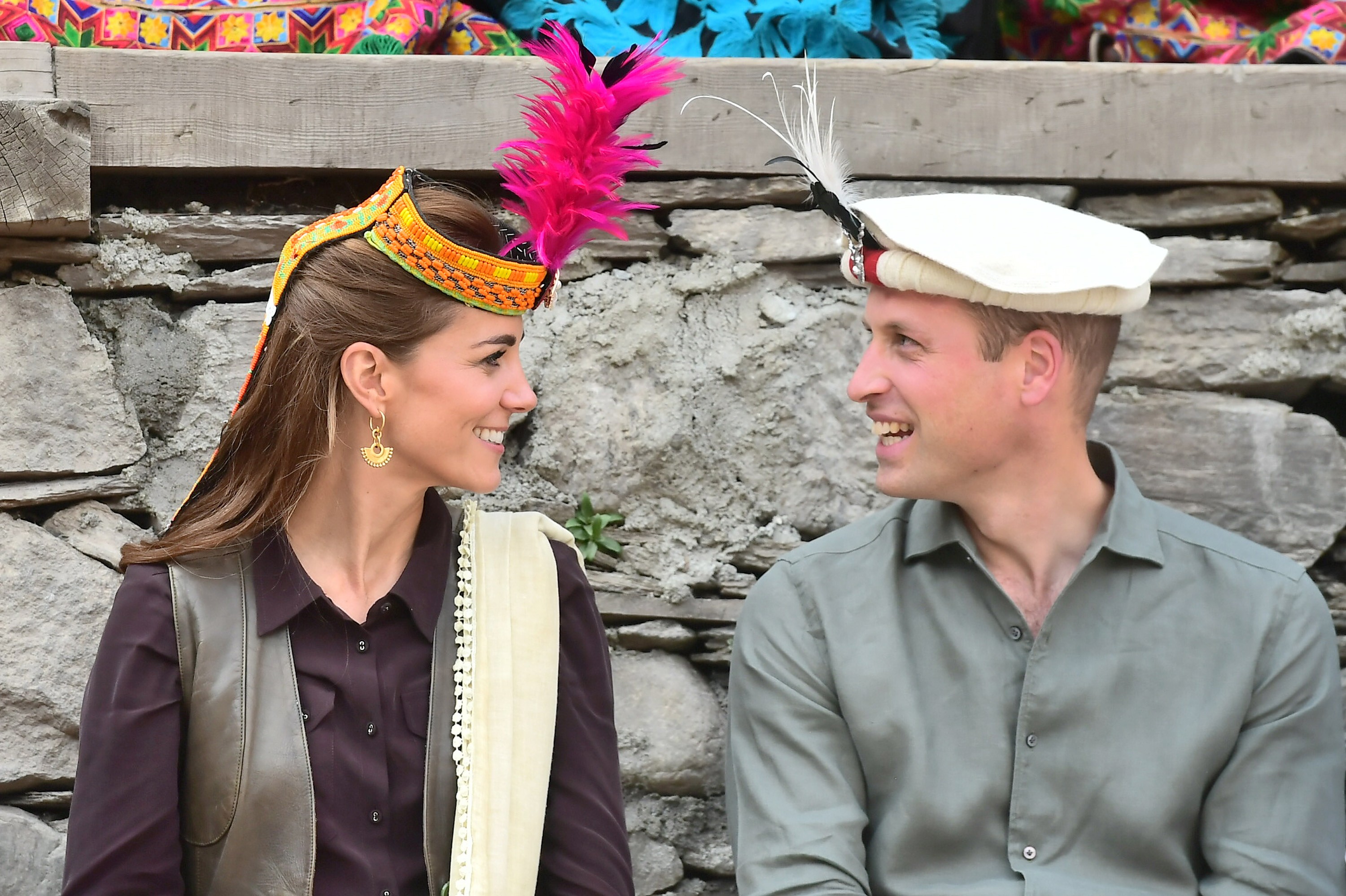 The Duchess and Duke of Cambridge wear a head dress and hat bestowed on them by members of the Kalash tribe in Chitral, Pakistan. Photo: EPA-EFE