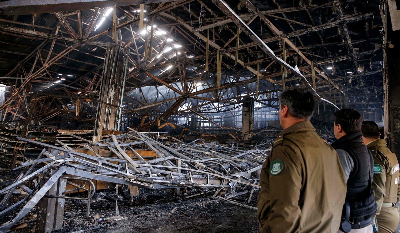The inside of the supermarket which was gutted in a fire which killed three people. Photo: AFP