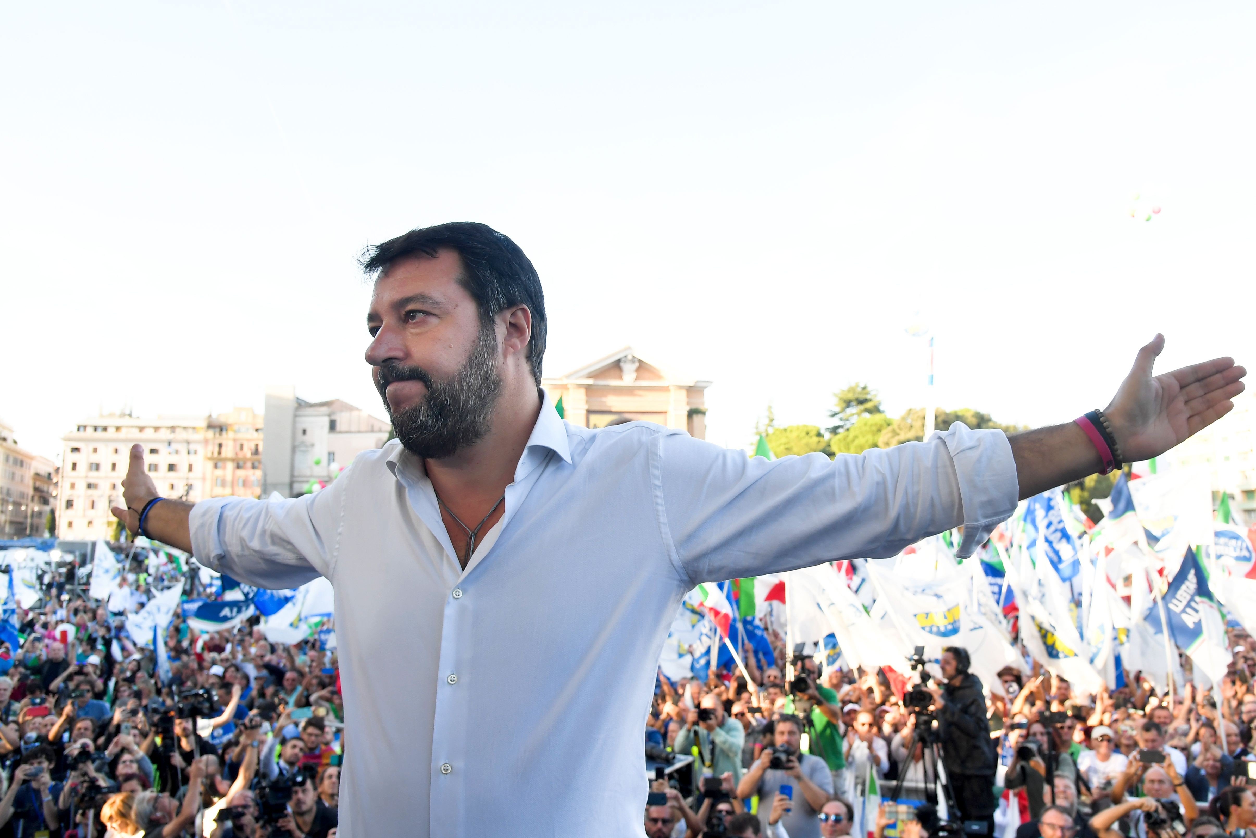 Leader of Italy's far-right League party, Matteo Salvini gestures as he prepares to address supporters during a rally of Italy's far-right League party. Photo: AFP