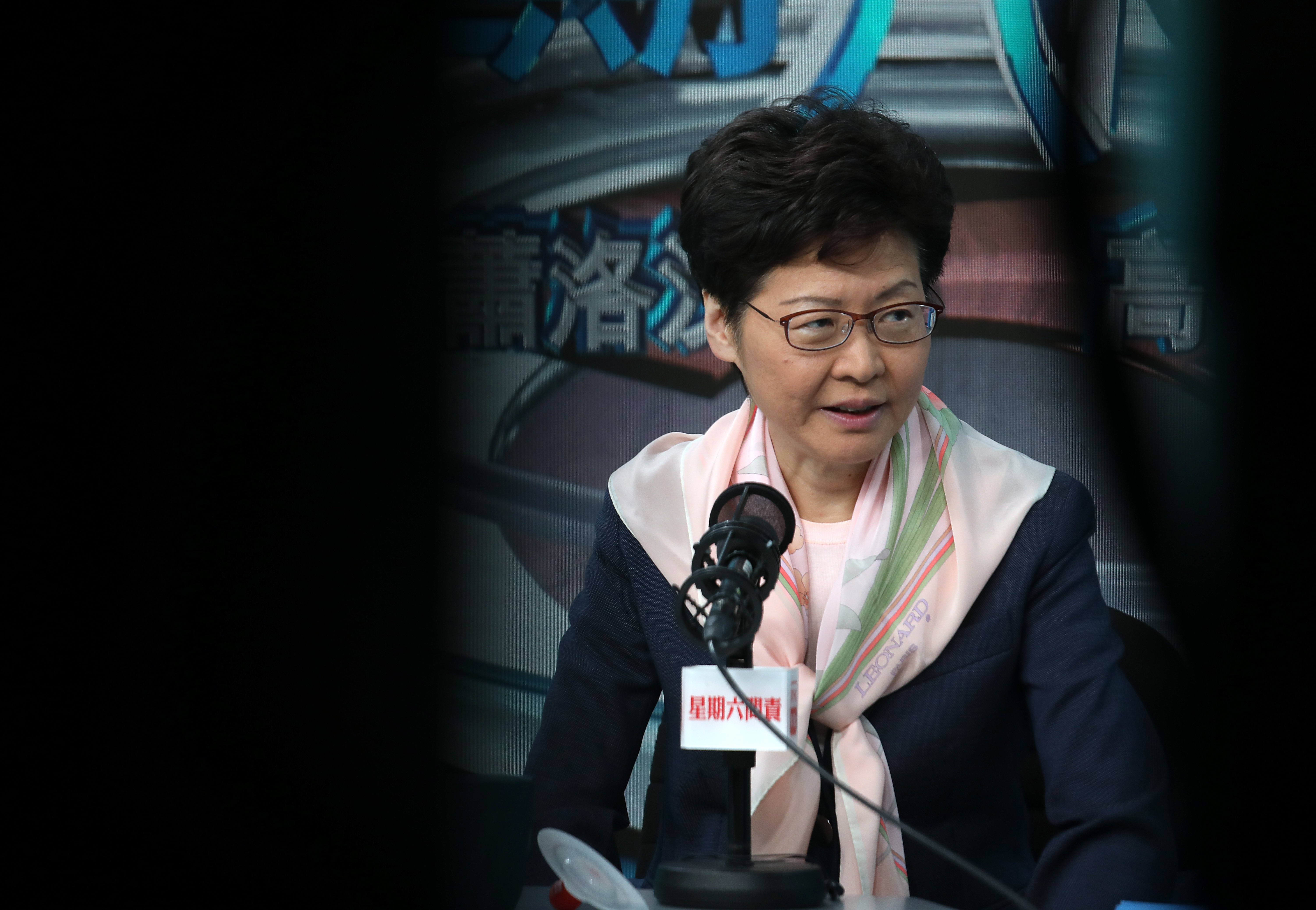 Carrie Lam has backed one of her advisers following conflict of interest concerns raised over property purchases made by his family. Photo: Xiaomei Chen