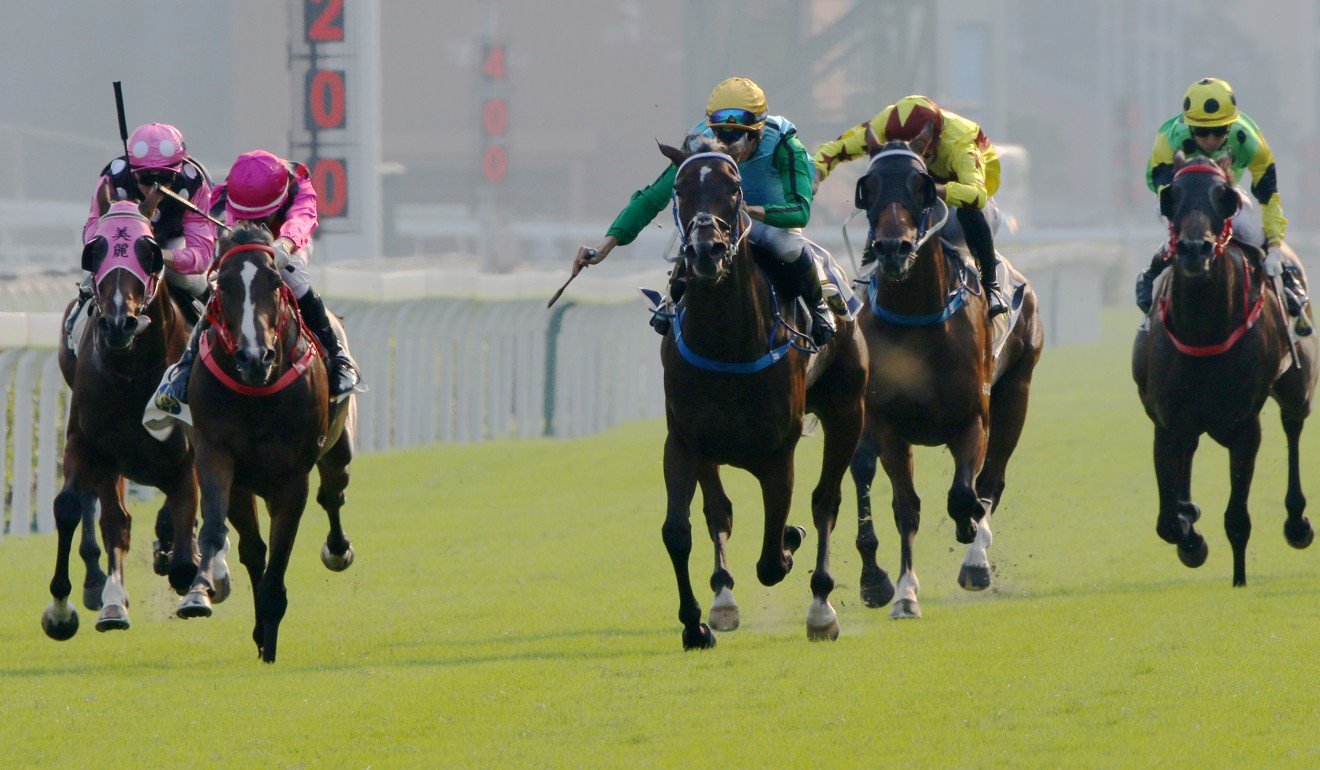 Rise High (right) and Waikuku (left) go past Beauty Generation in the straight at Sha Tin.