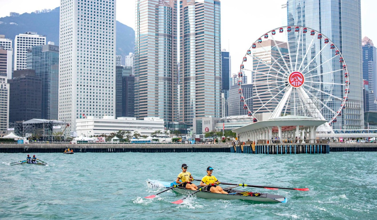Rowers power past Central during the Asian Coastal Rowing Championships. Photo: Handout