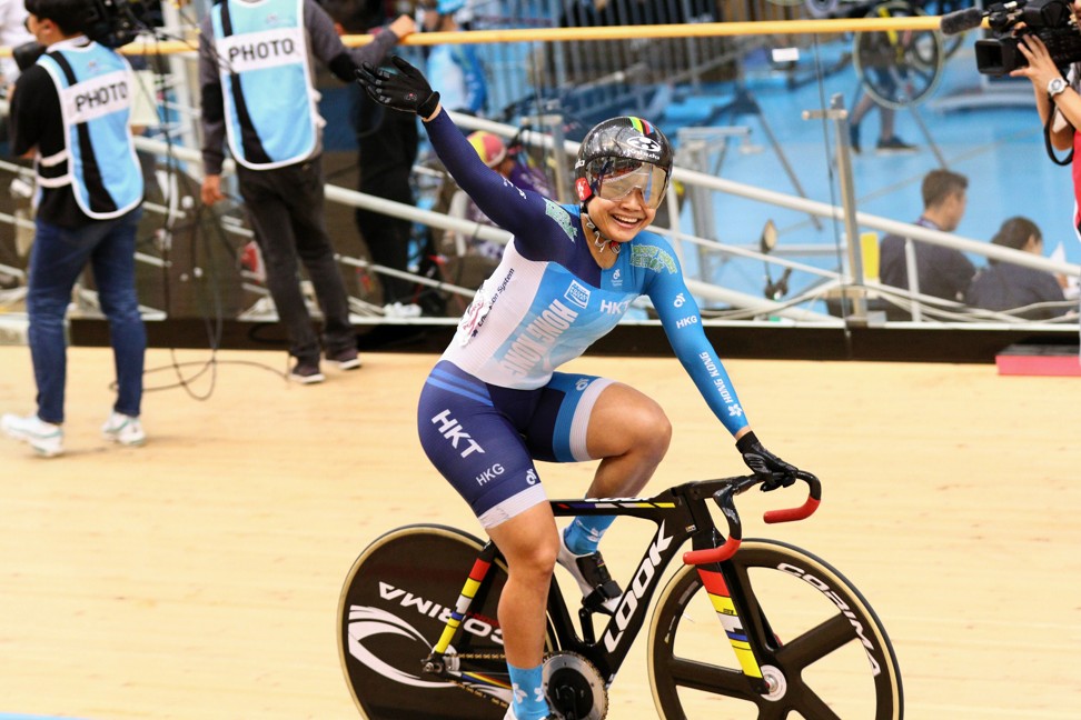 Sarah Lee on her victory lap after winning her second gold of the championships.