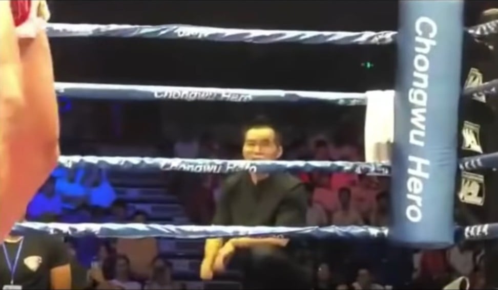 Ding Hao’s shifu and trainer, Yu Changhua, watches on. Photo: YouTube