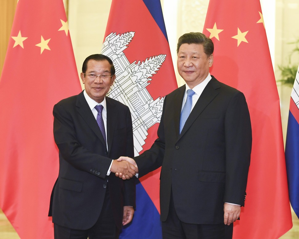 Cambodian Prime Minister Hun Sen (left) with Chinese President Xi Jinping in Beijing, China, in April. Photo: Kyodo