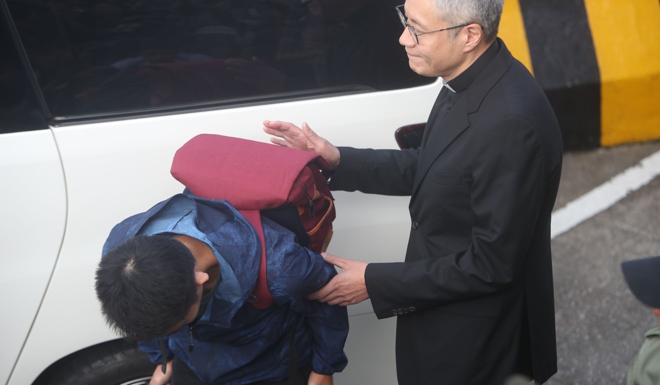 Chan Tong-kai, pictured with Reverend Canon Peter Koon, who has been visiting him in jail, bowed twice when he emerged from the facility on Wednesday. Photo: Winson Wong