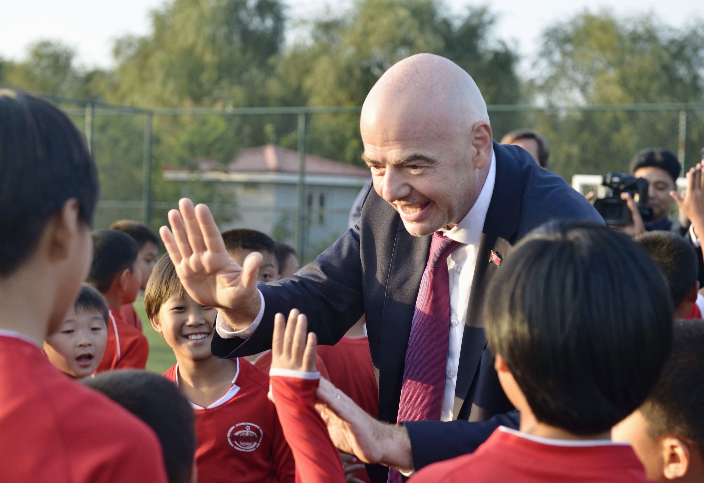 Fifa’s Gianni Infantino visits a football school in Pyongyang, North Korea. Photo: Kyodo