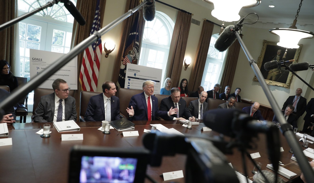 US President Donald Trump (centre) speaks during a Cabinet meeting at the White House on Monday. Photo: Bloomberg