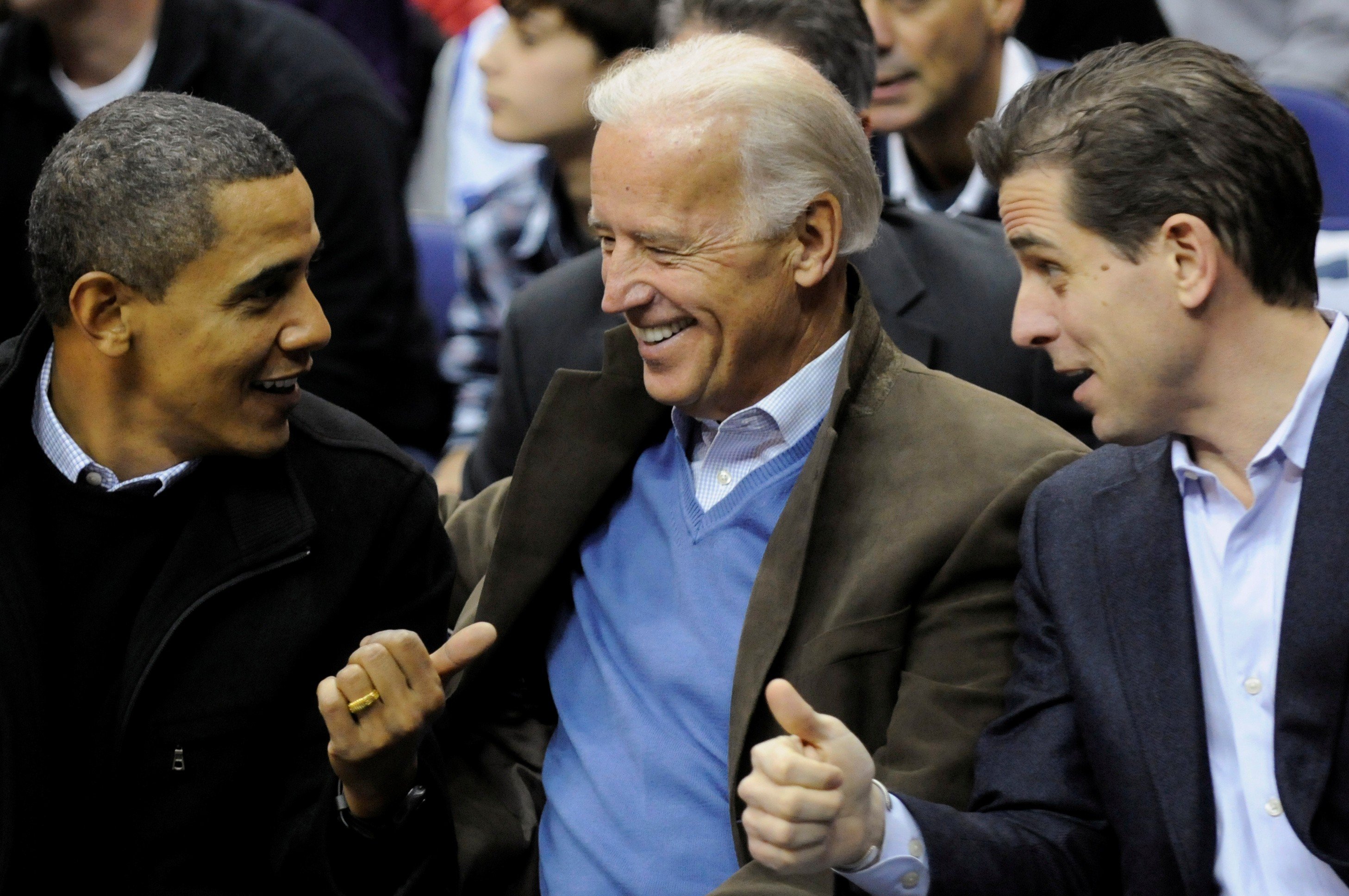 Barack Obama, the former US president, with then-vice-president Joe Biden and his son Hunter at a basketball game between Georgetown University and Duke University in Washington in 2010. Photo: Reuters