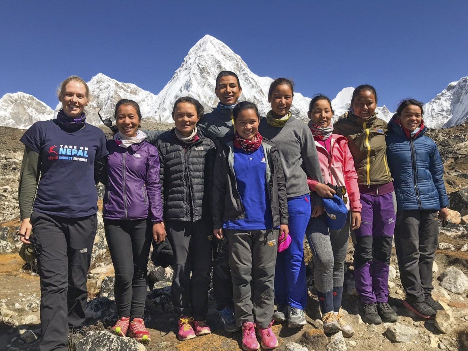 Take on Nepal co-founders Susan Devitt (left) and Som Tamang (4th from left) with their female tour guides. Photo: Take on Nepal