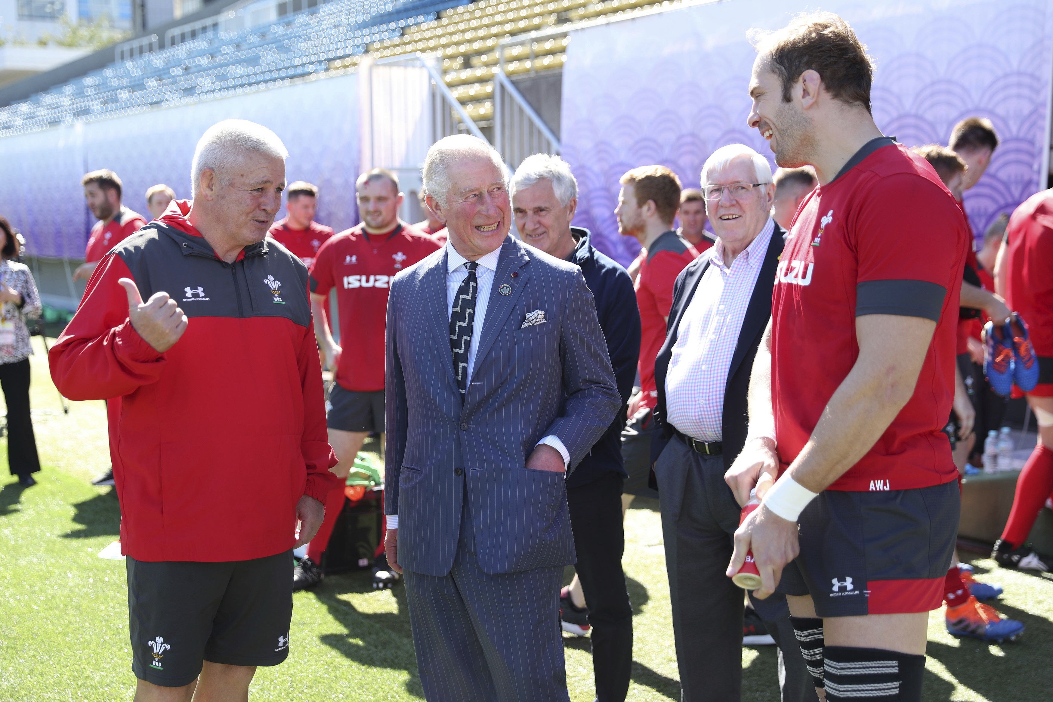 Prince Charles shares a moment with Wales head coach Warren Gatland (left) and captain Alun Wyn Jones (right). Photo: AP