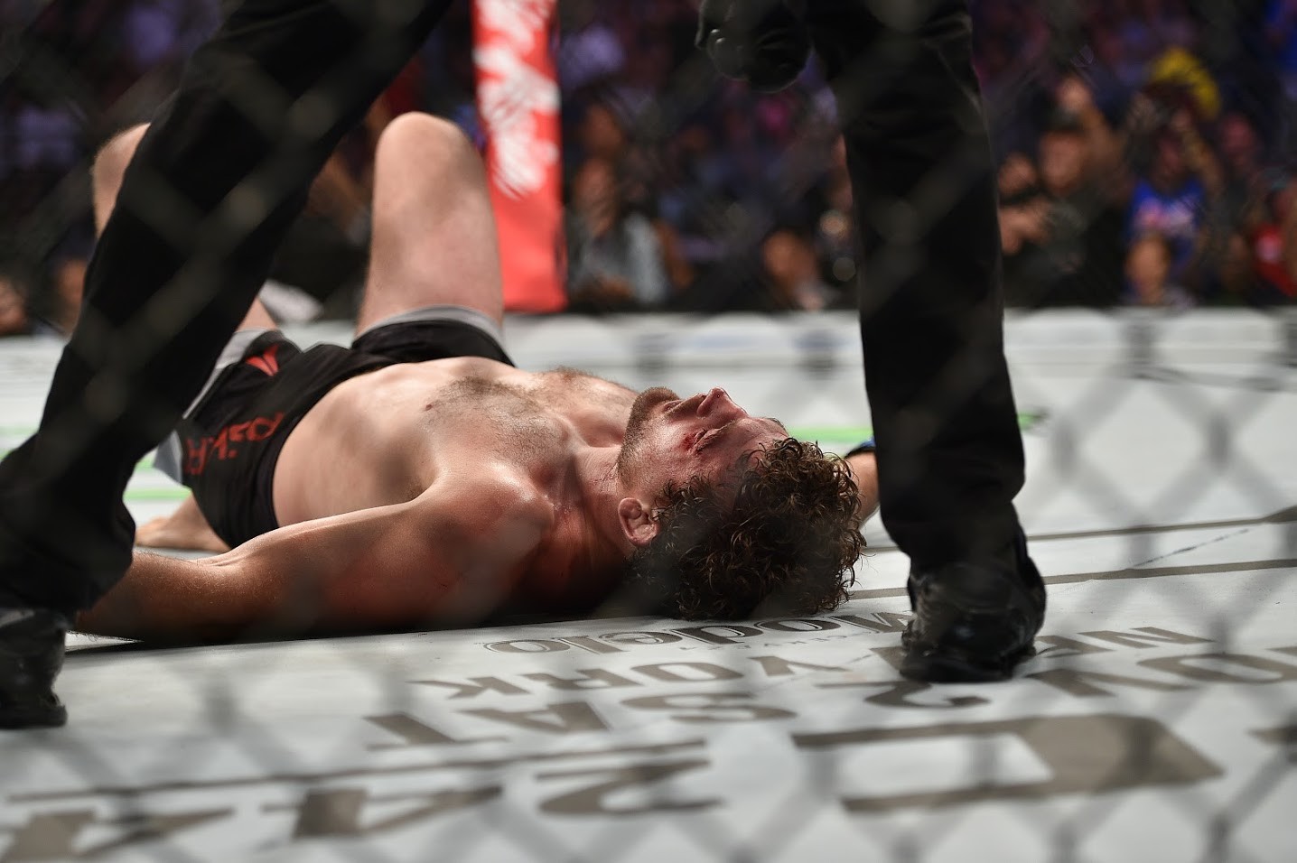 Ben Askren lies down on the canvas after tapping out to Demian Maia. Photos: SingaporeMaven