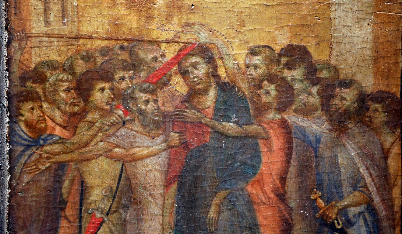 A part of the painting Christ Mocked, a long-lost masterpiece by Renaissance artist Cimabue, which was found months ago hanging in an elderly woman's kitchen in the town of Compiegne, is seen in Paris in September. Photo: Reuters