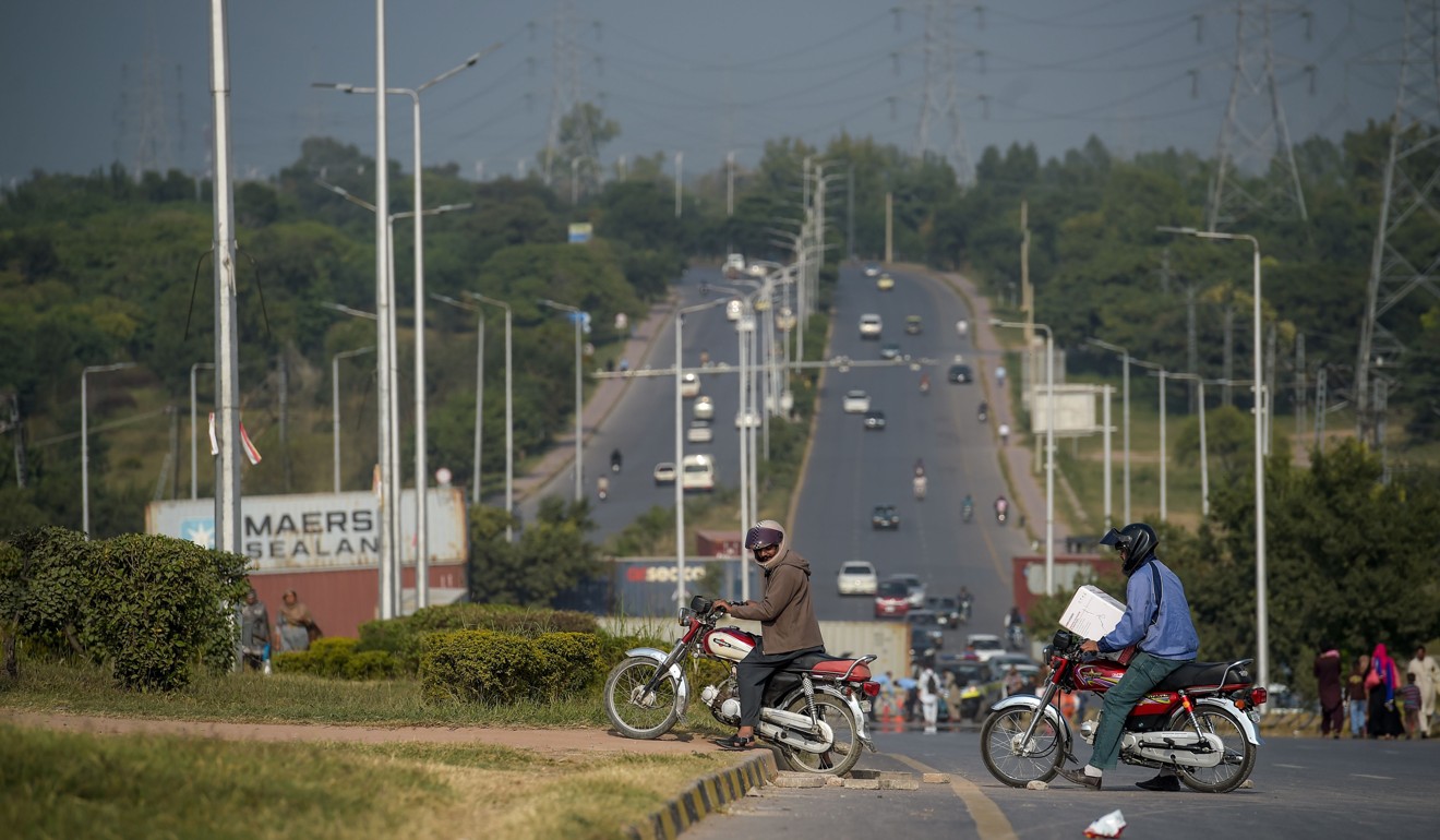 Shipping containers have been used to block major roads around the capital. Photo: AFP