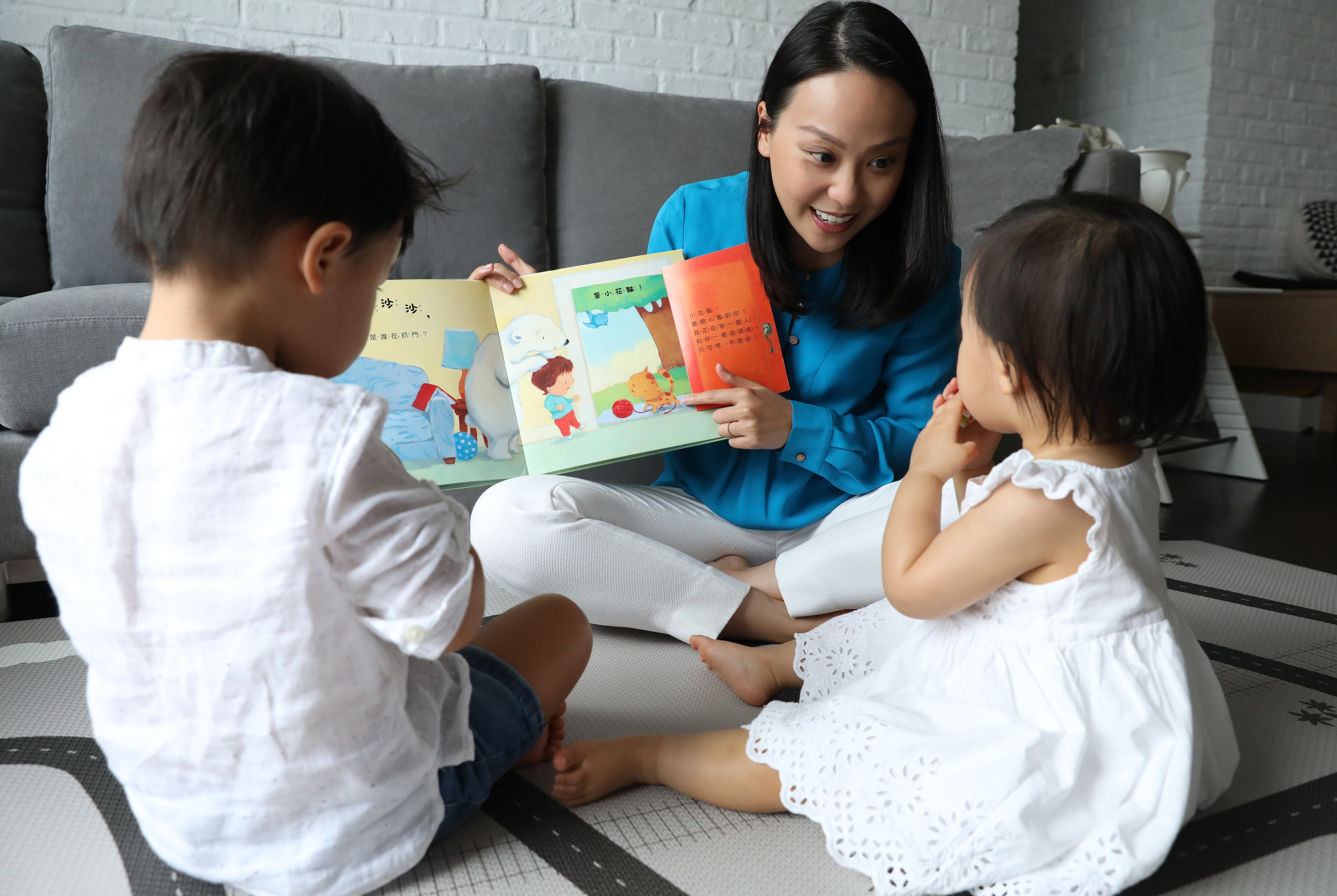 Portrait of Lisa Cheng, Hong Kong mother of two toddlers, with her three-year-old son and one-year-old daughter at home in Mid-Levels. Cheng talks about how she chose how long a gap to have before having second baby. 25OCT19 [FEATURES] SCMP / Nora Tam