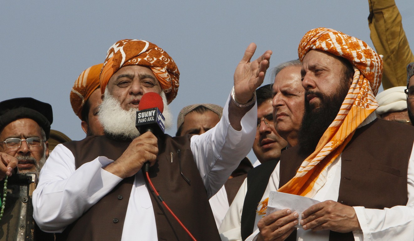 Pakistani cleric Maulana Fazlur Rehman, centre left, head of the Jamiat Ulema-e-Islam party. Photo: AP