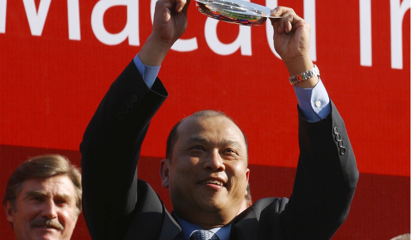 Joe Lau celebrates his win in the 2004 Hong Kong Macau Trophy.