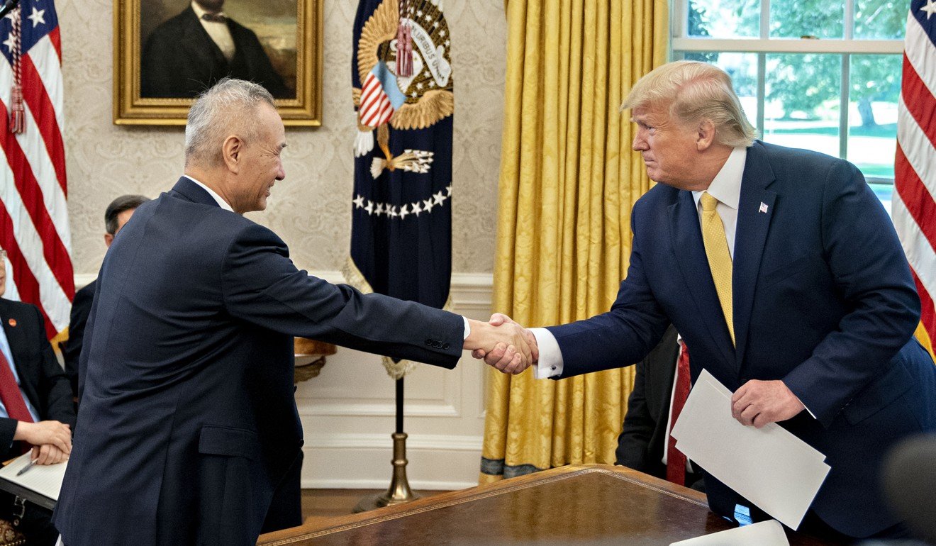 US President Donald Trump shakes hands with China’s vice-premier Liu He at a meeting in the Oval Office on October 11, 2019. Photo: Bloomberg