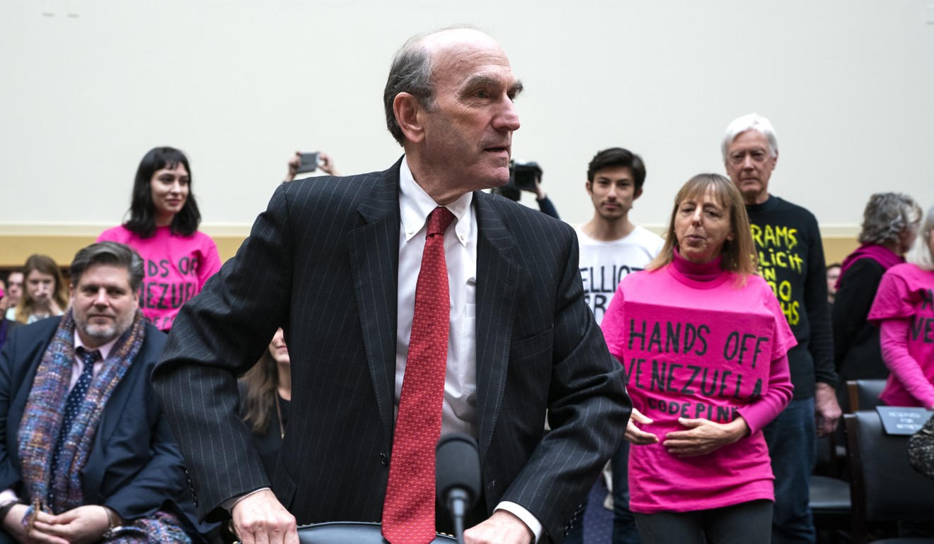Activists with Code Pink protest against Elliott Abrams, US Special Representative for Venezuela, as he prepares to testify before a committee hearing. Photo: EPA-EFE