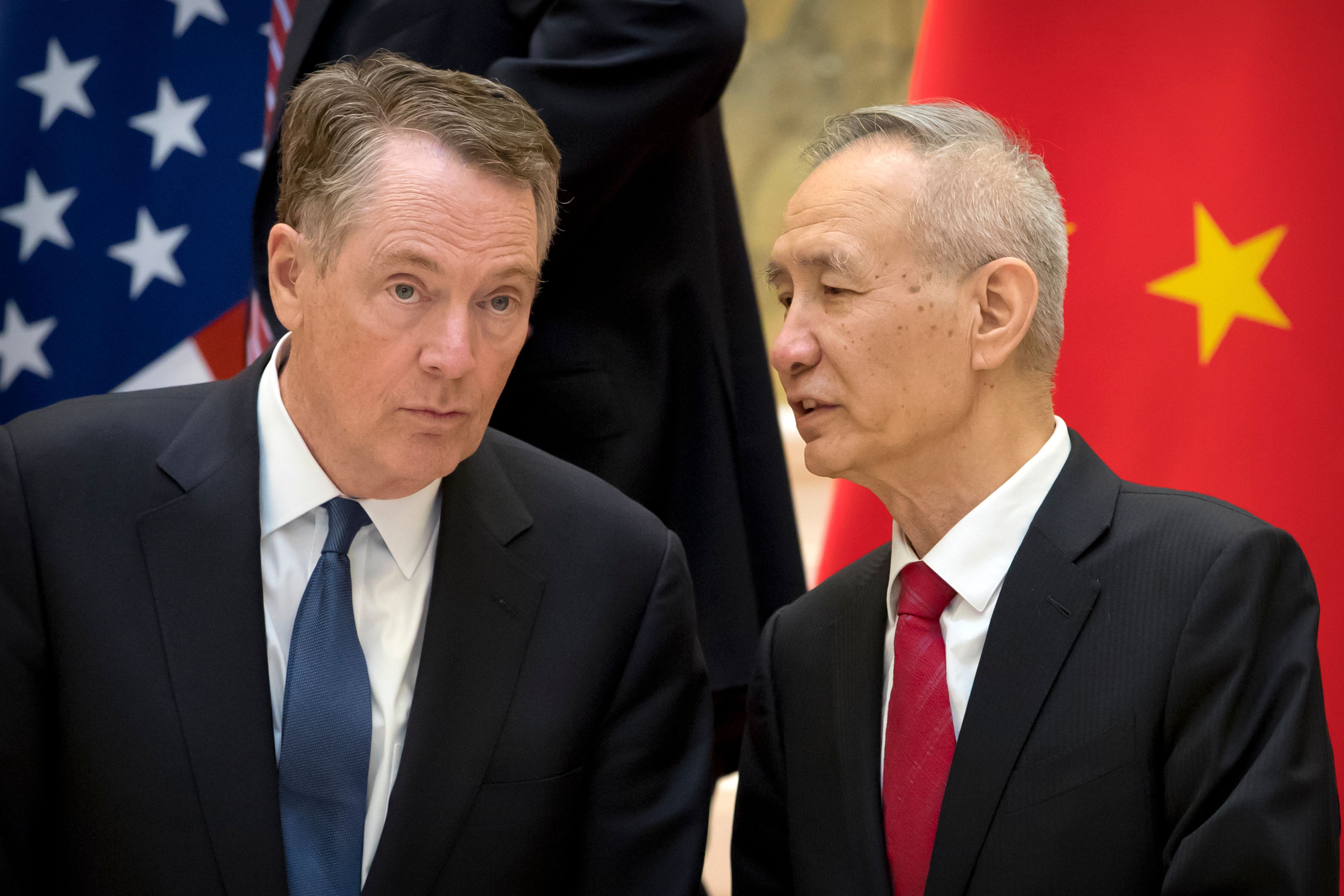US Trade Representative Robert Lighthizer (left) and Chinese Vice-Premier Liu He (right) spoke over the phone on Friday. Photo: AFP