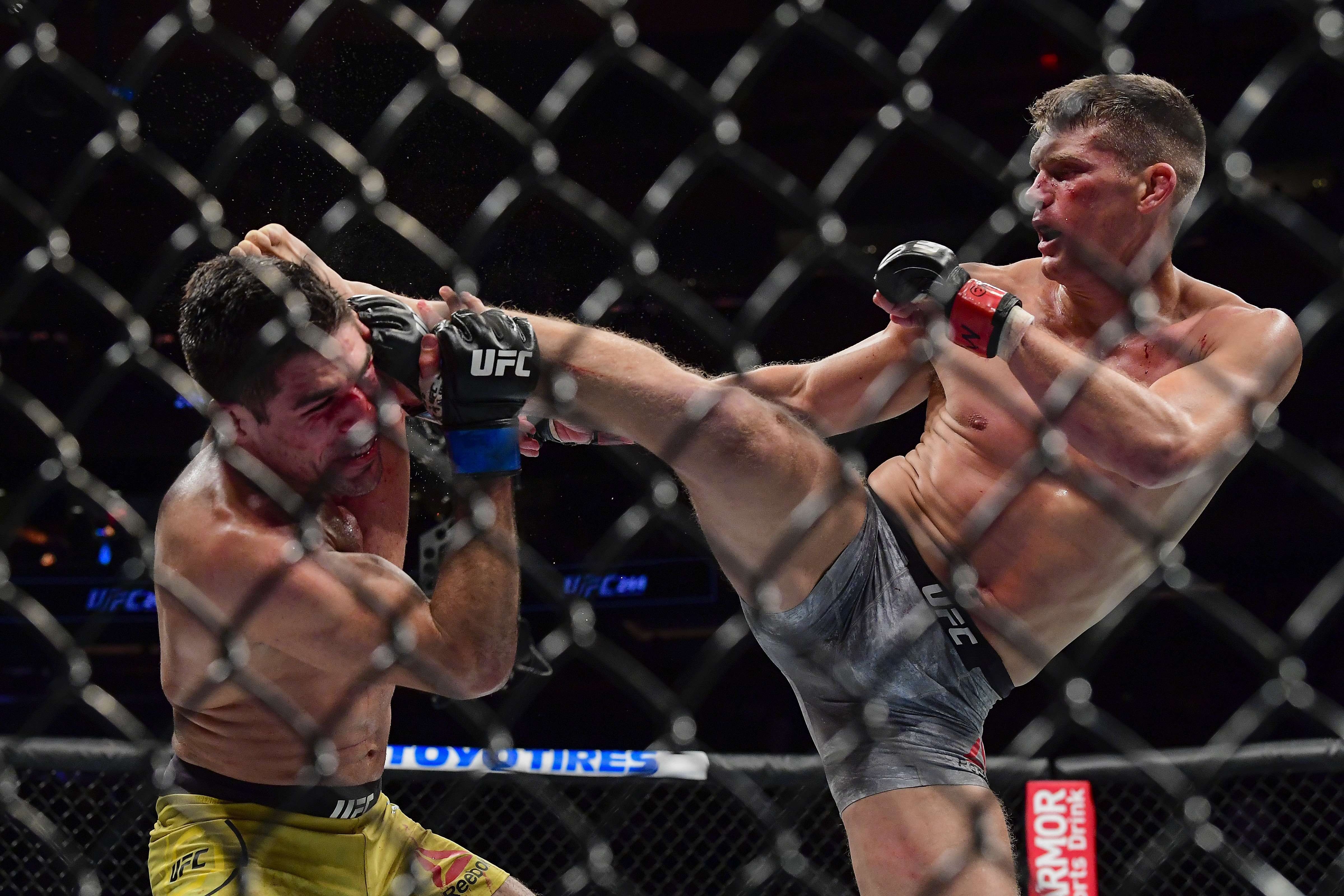 Stephen Thompson kicks Vicente Luque at UFC 244. Photo: AFP